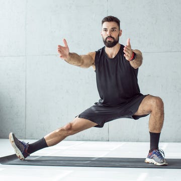 young men exercising in gym focusing on total body strength