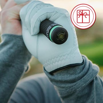 Golf grip held with a glove during a swing Golf grip held with a glove during a swing