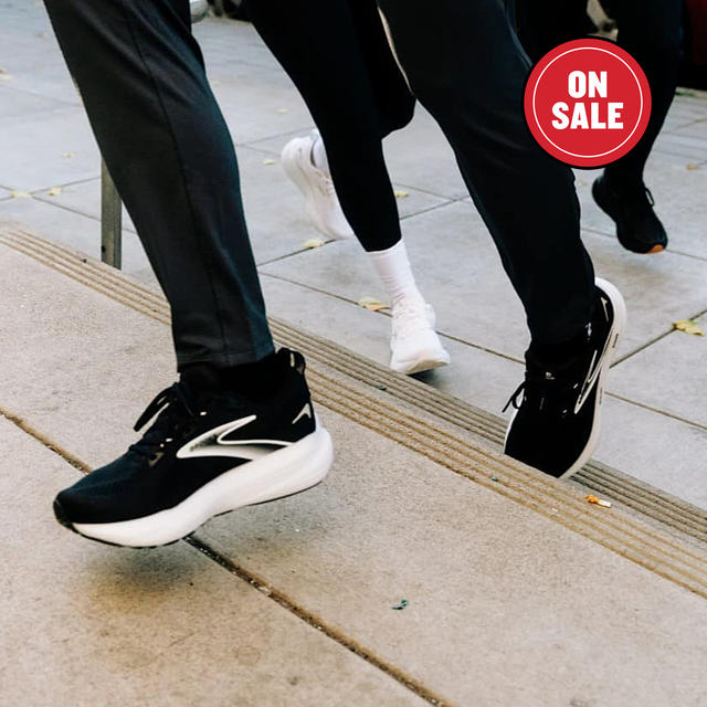 Footwear on sale, showcasing running shoes in motion.